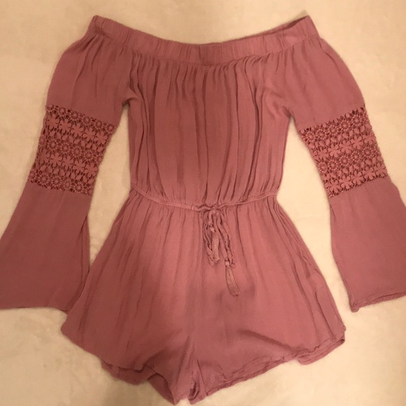 I am selling a pink romper. - Picture 1 of 2